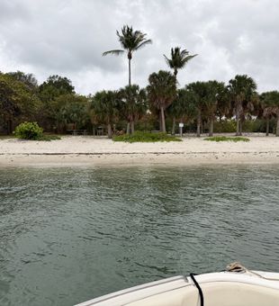 Calm West Palm Beach sandbar shoreline boat day coastal scenery