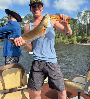 Redfish landed, smiles all around