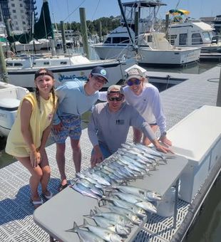 Atlantic Beach family fishing trips offer a safe, exciting way for kids and adults to experience the thrill of catching fish together.