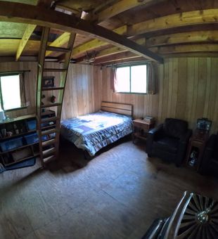 Sleeping quarters with loft above.