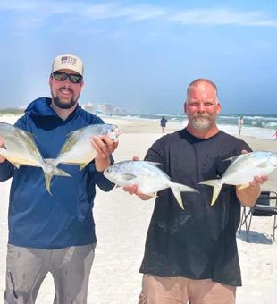 Sunny surf day with a solid pompano haul.