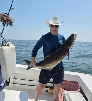 Sunrise over the Bay and a rod in hand.