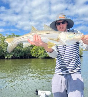 Coastal snook fishing moments in Hudson FL
