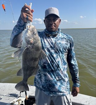 Nice black drum on light tackle! Perfect clear weather conditions made for an exciting adventure.