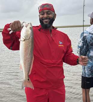 Beautiful Matagorda redfish brought to the boat!