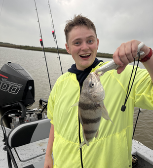 Reeling in a nice catch on the water!