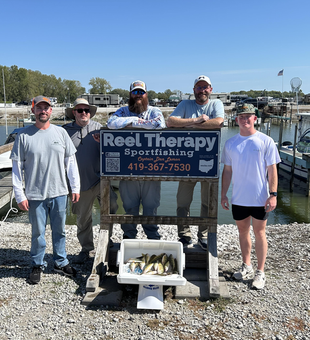 Great day on the water with jigging and trolling techniques in clear conditions!