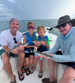 First-time anglers landing fish like seasoned pros