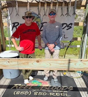 Smiles all around after a great day of Destin charter fishing
