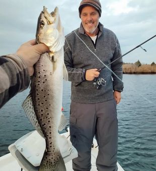 Reel in trophy seatrout on the waters of Manns Harbor, NC!