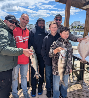 Reeled in a trio of tasty striped bass, flounder, and bluefish off the Atlantic City coast!