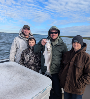 An impressive 23-inch Striped Bass reeled in at 500 Bayshore Ave!