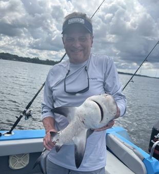 Big smiles with an impressive Shark catch!
