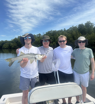A massive Snook caught on a fishing trip with friends!