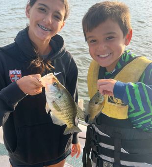 Sibs are enjoying their fishing experience! - Mannford, OK.