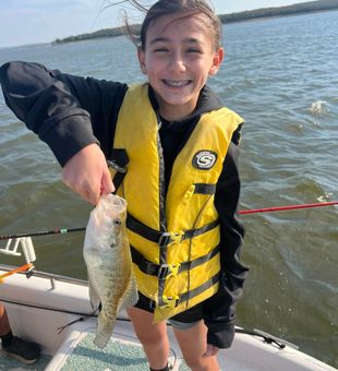 Little girl and her crappie! 