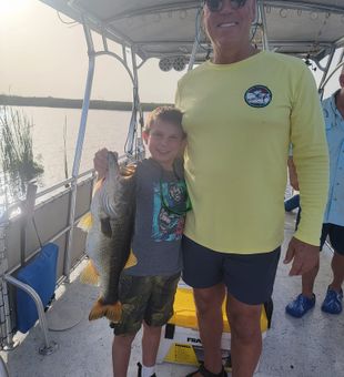 Proud young angler with a Headwaters Lake Bass!