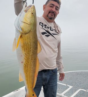 Hooked! Reeling in a trophy Redfish