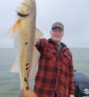 Landing a prized Redfish