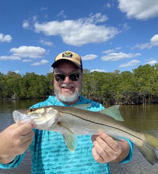 Glide through Naples’ calm backwaters on a scenic inshore fishing adventure filled with sunshine and coastal beauty