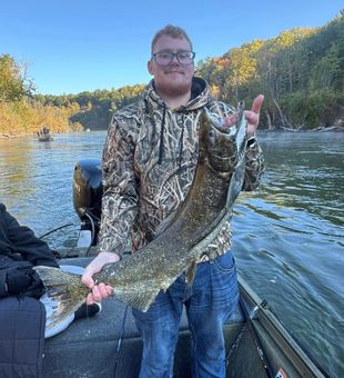 Enjoy Michigan river fishing with top local guides and expert tips.