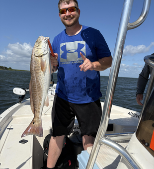 Reeling in redfish glory with epic deep sea action!