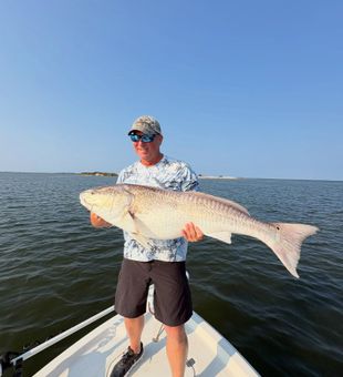Beautiful Wanchese NC redfish making memories on the water!