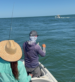 Peaceful day on the water casting a line.
