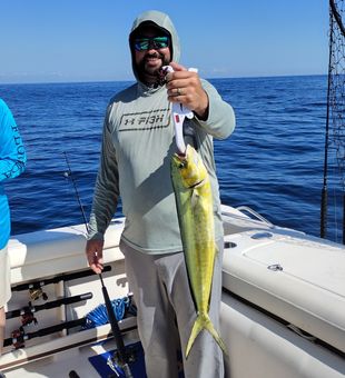 Proud grin. Vibrant Mahi.