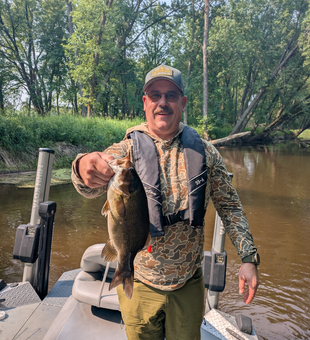 Boat, rod, and river smallmouth