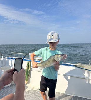 Sunrise over the Western Basin and rods bending — that’s fishing in Lakeside Marblehead, Ohio done right.