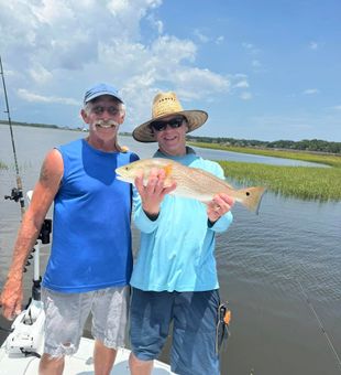 Jacksonville redfish bringing smiles to the boat!