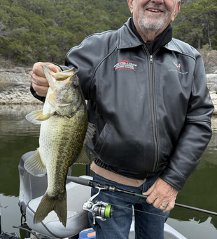 Impressive bass caught on Lake Austin using fly fishing.