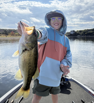 Nice largemouth bass caught with light tackle! Great day on the water despite the clouds.