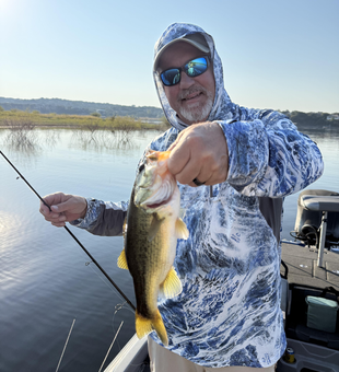 Nice largemouth bass caught using fly fishing and light tackle in clear conditions!