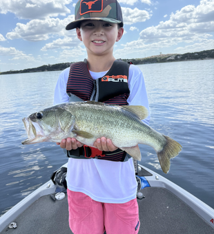 Nice largemouth bass using fly fishing and light tackle on a partly cloudy day!