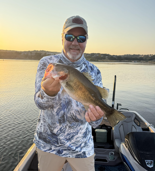 Nice largemouth bass caught with fly fishing and light tackle during clear conditions!