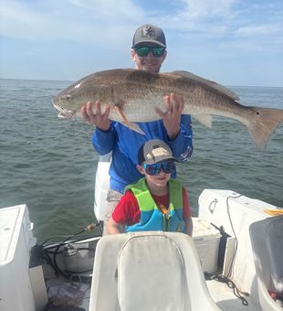 Giant redfish catch St. George Island fishing charters