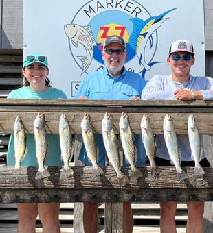 Epic Speckled Trout haul on the dock!
