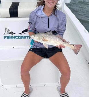 Reeling in redfish at Port Aransas.