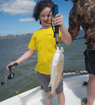 Galveston redfish caught on light tackle drift fishing.