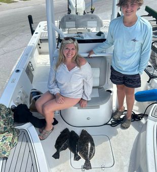 Mom and Son Happy with their Flounder Haul - Oak Island, NC.