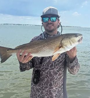 Bring the whole family together for a day of casting lines, learning new skills, and enjoying inshore fishing in Oak Island, North Carolina.