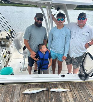 Create unforgettable memories with family and friends on an exciting inshore fishing trip in Oak Island, NC. Perfect for anglers of all skill levels.