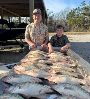 Reeling in big ones with Lone Cypress Fishing.