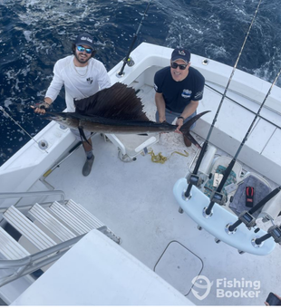 Reeling in the big one on the open seas.