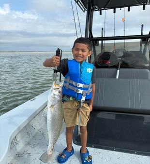 Hands full of fish and hearts full of joy