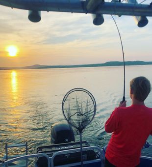 Sunrise Serenity with Striped Bass.