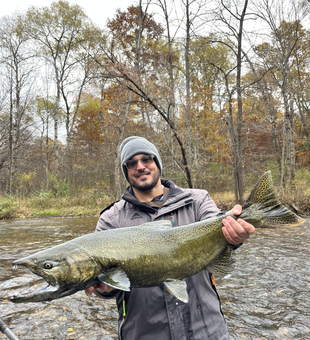 Great catch on the fly today! Clouds rolling in but the fishing stayed hot.