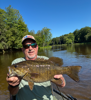 Michigan smallmouth bass caught fly fishing on the river!